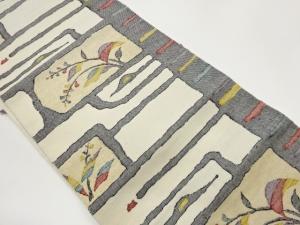 変わり横段に草花模様織出し名古屋帯